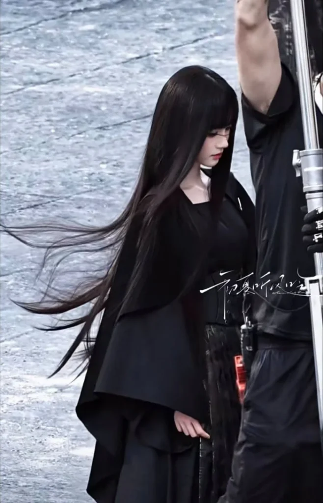 Ju Jingyi as Su Luxia in a black corset costume on the set of Wan Hua Sin.