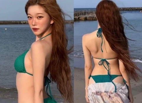 Billlie Tsuki wearing an emerald bikini and long skirt on Awaji Island beach