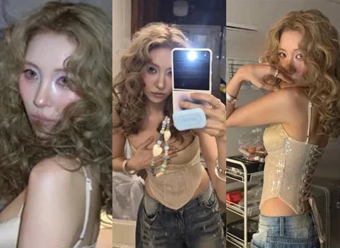 Sunmi wearing a champagne gold sequined corset top with a bright golden brown hippie perm hair on a music video set