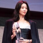 Actress Jun Ji-hyun holding her Extraordinary Star Asia Award at the 25th New York Asian Film Festival gala