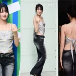 i-dle Minnie wearing a vintage scarf top and black bootcut denim pants