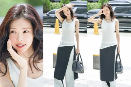Actress Son Naeun wearing a white sleeveless top and a black long skirt with a slit