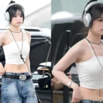 BABYMONSTER member Ahyeon posing for media at Incheon International Airport Terminal 1 before departing for Macau