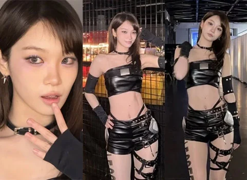 LE SSERAFIM member Kim Chaewon posing in a black leather warrior crop top outfit