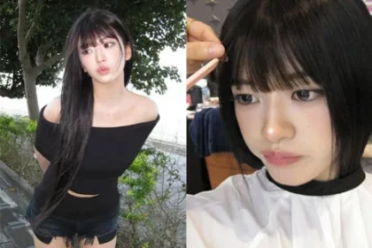 An Yujin wearing a black off-the-shoulder top and denim shorts outdoor photoshoot