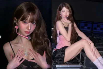 Jang Wonyoung posing in a pink corset outfit backstage at IVE Hong Kong concert