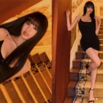 KISS OF LIFE Natty posing in a black mini dress on palace stairs