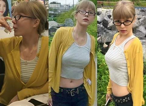 Former AOA member Shin Ji-min holding a soju glass in a yellow cardigan and glasses