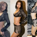 BLACKPINK Jennie posing in a bra top and short skirt stage outfit at Roskilde Festival