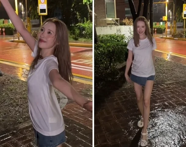 "Is Sunmi Okay?" She Casts Aside Her Umbrella in a Downpour, Mesmerizing Fans with Her Slender Visuals sunmi forever july rain dance instagram 1