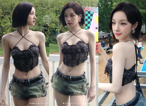 (i-dle) Yuqi performing in a black halter-top bustier at Lollapalooza Chicago