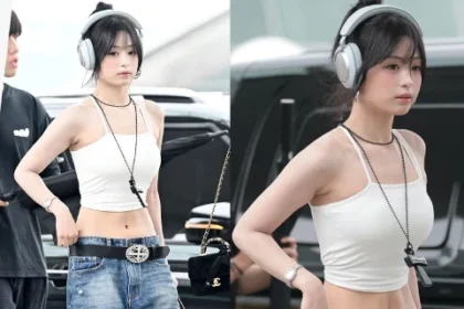 BABYMONSTER member Ahyeon posing for media at Incheon International Airport Terminal 1 before departing for Macau