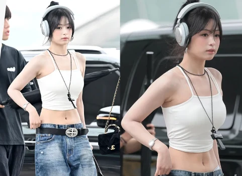 BABYMONSTER member Ahyeon posing for media at Incheon International Airport Terminal 1 before departing for Macau