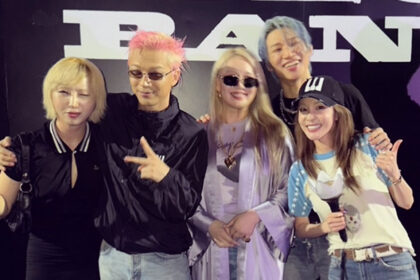 BIGBANG members G-Dragon, Taeyang, Daesung with 2NE1 members CL, Sandara Park, Gong Minzy backstage reunion photo