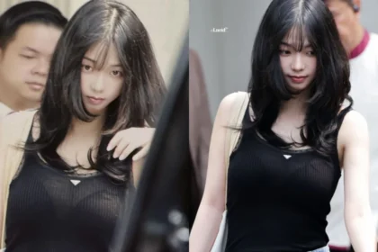 aespa Karina bare-faced visuals at Singapore Changi Airport wearing a black tank top
