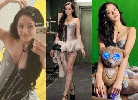 BLACKPINK member Jisoo posing at an amusement park showing off her doll-like visuals