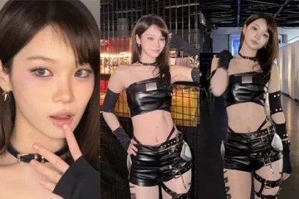 LE SSERAFIM member Kim Chaewon posing in a black leather warrior crop top outfit