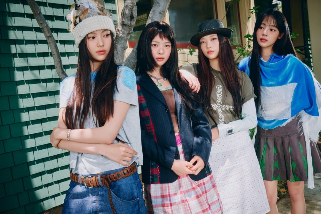 ADOR and NewJeans logo alongside Dolphiners Films director's cut controversy news
