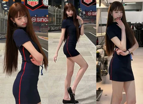 IVE Jang Wonyoung posing in a navy Tommy Hilfiger dress at Singapore race track